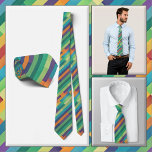 Gravata NECKTIE - Stripes Diagonais Multicolores<br><div class="desc">Uma imagem diagonal de várias cores em tons de azul, verde e laranja é apresentada nesta atraente gravata masculina (camisa e modelo não incluídos). A imagem cobrir toda a frente e atrás da gravata. Não pode ser removido ou substituído da frente (veja NOTA abaixo), mas pode ser reposicionado para uma...</div>