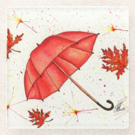 Guarda-chuva vermelha brilhante e folhas vermelhas