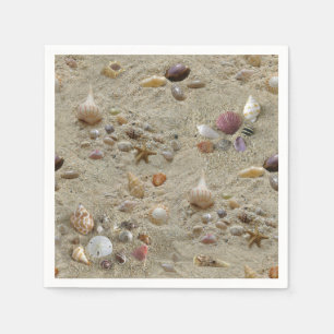 Guardanapo De Papel Conchas montadas na areia da praia