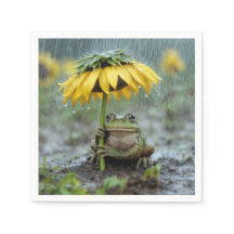 Sapo sob um guarda-chuva de girassol na chuva