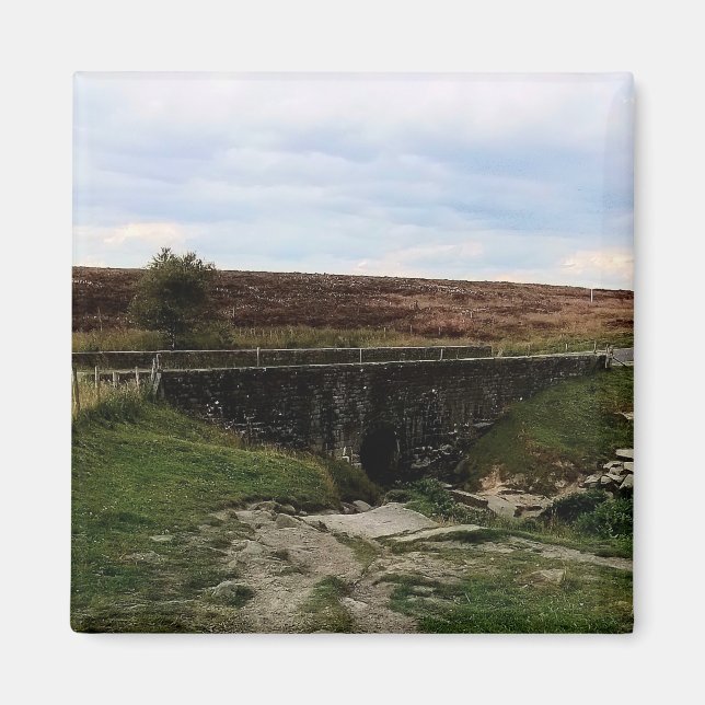 Imã A ponte, no campo (Frente)