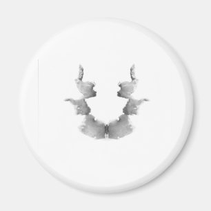 Imã A tinta do teste de Rorschach borra as caras das