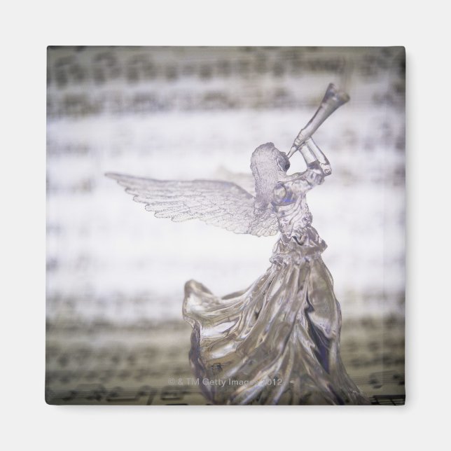 Imã Anjo de vidro que toca trompete e imagem da folha (Frente)