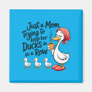 Imã Apenas uma mãe mantendo os patos em fila