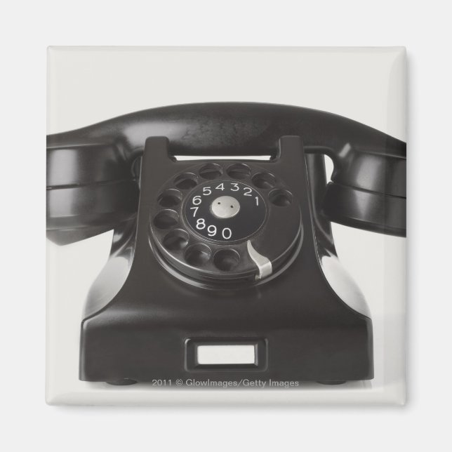 Imã Aproximação de um telefone rotativo (Frente)