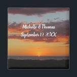 Imã Beach Wedding Orange Sunset Pacific Guest Favor<br><div class="desc">This beach wedding guest favor magnet features a photo of the sun setting over the Pacific Ocean. The sunset lights up the sky and underside of the clouds in bright orange with a stripe of gray blue still visible between the clouds. The foreground captures the dunes in shadow as the...</div>