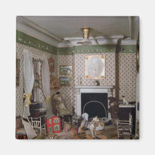 Imã Berçário com os brinquedos da "senhorita Milha"