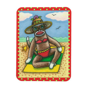 ÍMÃ BICHETE VERMELHO DE MACACO, NA PRAIA DE CARTOON,