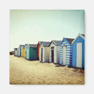 Imã Cabanas coloridas da praia em The Sun