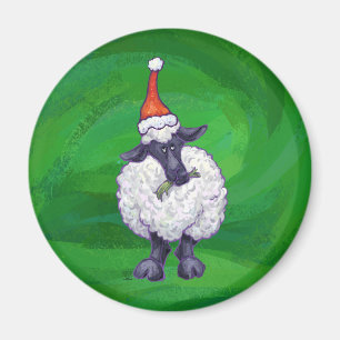 Imã Carneiros bonitos no chapéu do papai noel no verd