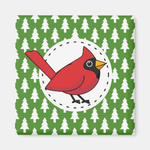 Imã Cartoon Red Cardinal sobre Pinheiros Brancos Verde