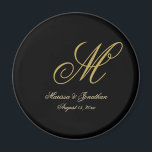 Imã Casamento Preto com Script Monograma Dourado Chic<br><div class="desc">Este elegante íman de casamento de monograma preto vai adicionar classe aos presentes favoritos. O modelo de design chic apresenta a inicial do monograma do sobrenome do noivo junto com os primeiros nomes da noiva e do noivo e a data do casamento em ouro falso para personalizar. Por favor, veja...</div>