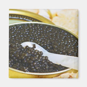 Imã Caviar preto e uma colher de madrepérola para