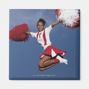 Imã Cheerleader no meio do ar