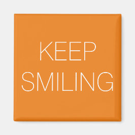 Imã Continue sorrindo, ímã branco laranja