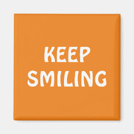 Imã Continue sorrindo, ímã branco laranja