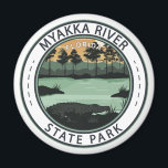 Imã Crachá do Parque Estadual do Rio Myakka na Flórida<br><div class="desc">Parque Estadual do Rio Myakka num estilo de arte vetorial. Escondido no coração da Flórida, o Parque Estadual do Rio Myakka é um refúgio para amantes da natureza e entusiastas do exterior. Com sua vasta extensão de zonas úmidas, trilhas cênicas e abundância de vida selvagem, ela oferece uma experiência cativante...</div>