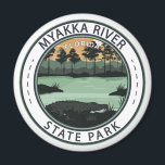 Imã Crachá do Parque Estadual do Rio Myakka na Flórida<br><div class="desc">Parque Estadual do Rio Myakka num estilo de arte vetorial. Escondido no coração da Flórida, o Parque Estadual do Rio Myakka é um refúgio para amantes da natureza e entusiastas do exterior. Com sua vasta extensão de zonas úmidas, trilhas cênicas e abundância de vida selvagem, ela oferece uma experiência cativante...</div>