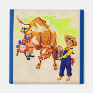 Imã crianças adoráveis com uma vaca adorável
