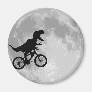 Imã Dinossauro numa bicicleta com lua