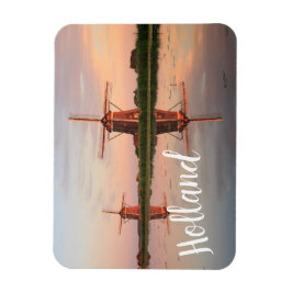 Ímã Dois moinhos de vento com reflexo no pôr do sol