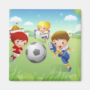 Imã Duas meninas e um menino que joga o futebol