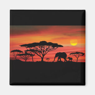 Imã Elefante e pôr do sol laranja no Serengeti