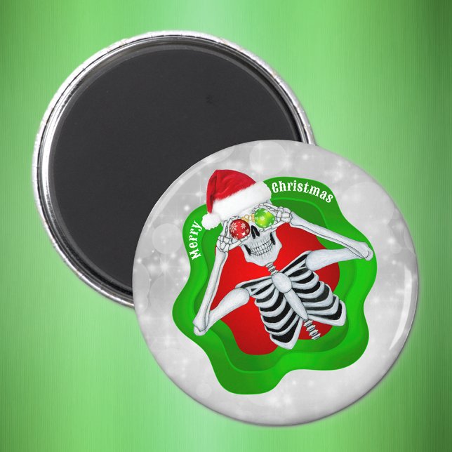 Imã Esqueleto de Natal Ornamentos Forma de Splatter Cí (Fun Skeleton ornament Eyes Santa hat white circles on Merry Christmas magnet.)