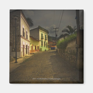 Imã Estrada do Cobblestone & construções amarelas em