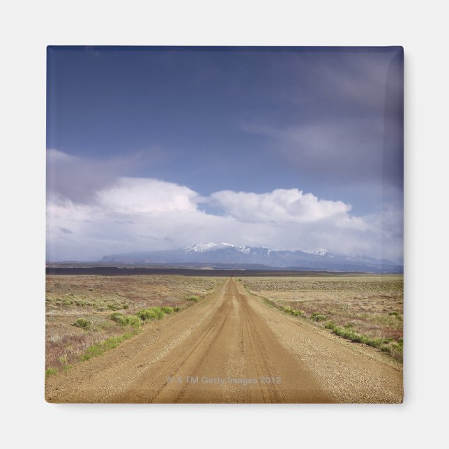 Imã EUA, Utah, estrada Dirt atravessando paisagem (Frente)