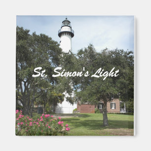 Imã Farol, gramado e arbusto de flores