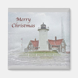 Imã Farol na neve Feliz Natal