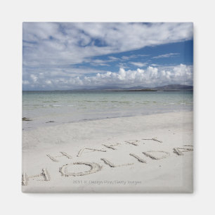 Imã Feriado feliz escrito na praia de Eilogarry