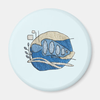 Imã Fisch im Stickdesign