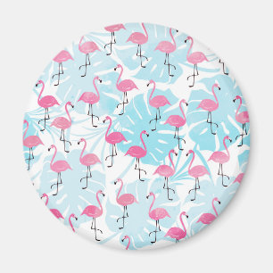 Imã flamingos graciosos e folhas de monstera