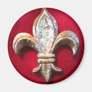 Imã Flor de lis Dourado no vermelho