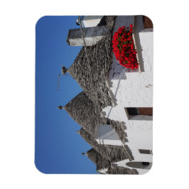 Ímã Flores de gerânio e casas de trulli em Alberobello