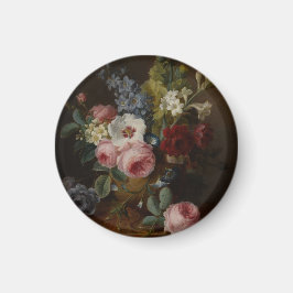 Imã Flores num vaso num bordo de mármore