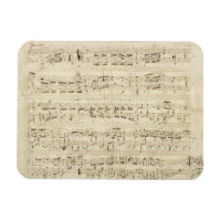 Folha de música em pergaminho manuscrita a tinta