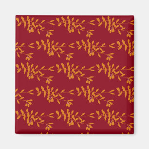 Imã Folhas do ramo da silhueta laranja em vermelho