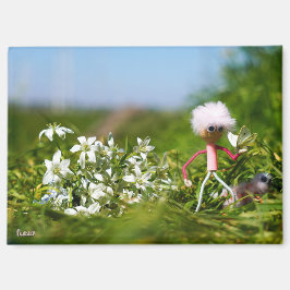 Imã Fubby met Vlinder in een zomers landschap.