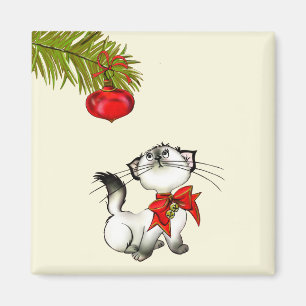 Imã Gatinho brincalhão do Natal com um arco vermelho