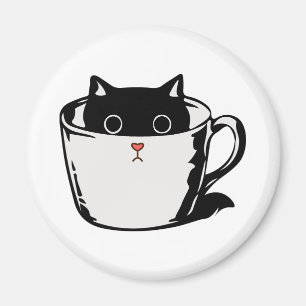 Imã Gato preto com nariz vermelho escondido em um copo