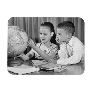 Ímã Globo da visão do menino e da menina