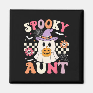 Imã Groovy Spooky tia Ghost segurando abóbora
