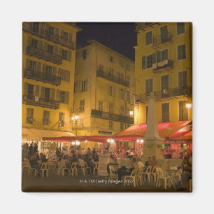 Imã Grupo de pessoas que senta-se em um café do