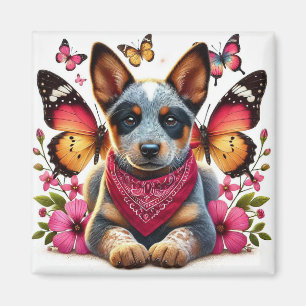 Imã Heeler Puppy cercado por borboletas e flores