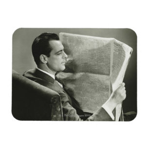 Ímã Homem de negócios que lê o jornal