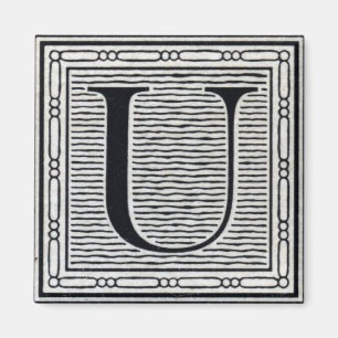 Imã Inicial de Woodblock do Woodcut da letra de bloco