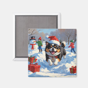 Imã Japanese Chin Correndo na Neve com Chapéu de Natal